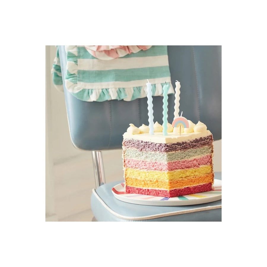 Meri-Meri-rainbow-candle-on-cake